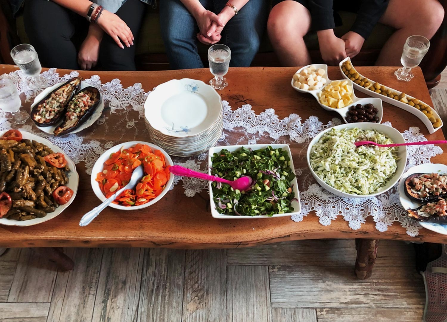 Traditional Arabic dishes shared around a table in Israeli woman's home